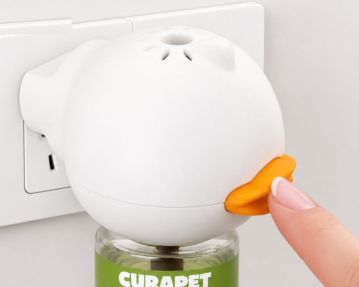 Press the CURAPET diffuser once it is plugged in