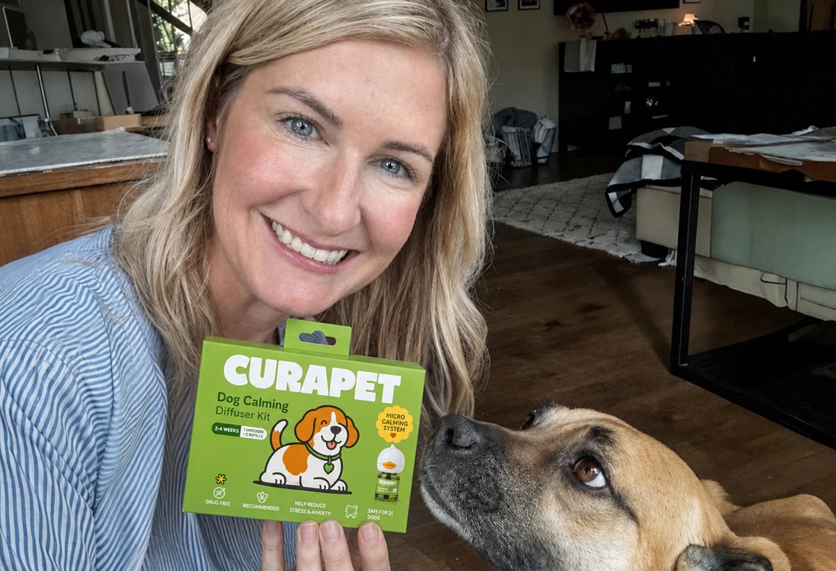 Woman and tan dog with a CURAPET kit